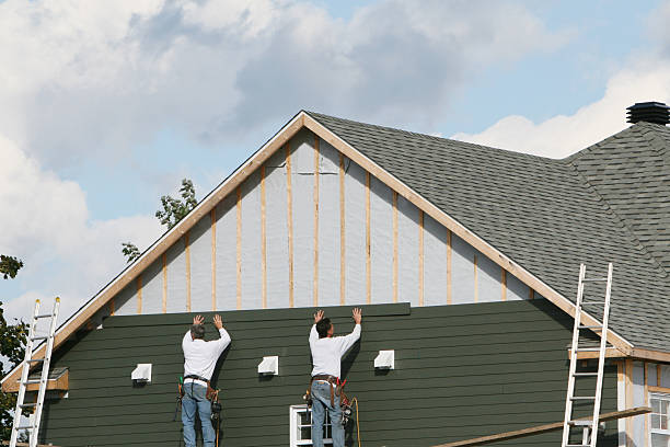 Professional Siding technician working in Denton, TX